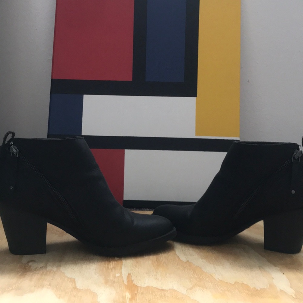 Slightly worn leather dress boots
